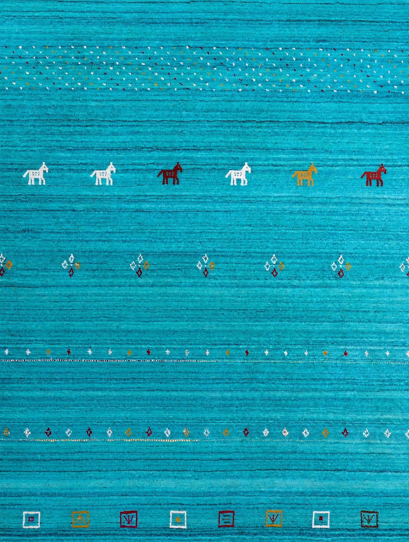 Turquoise Rug Flat Lay