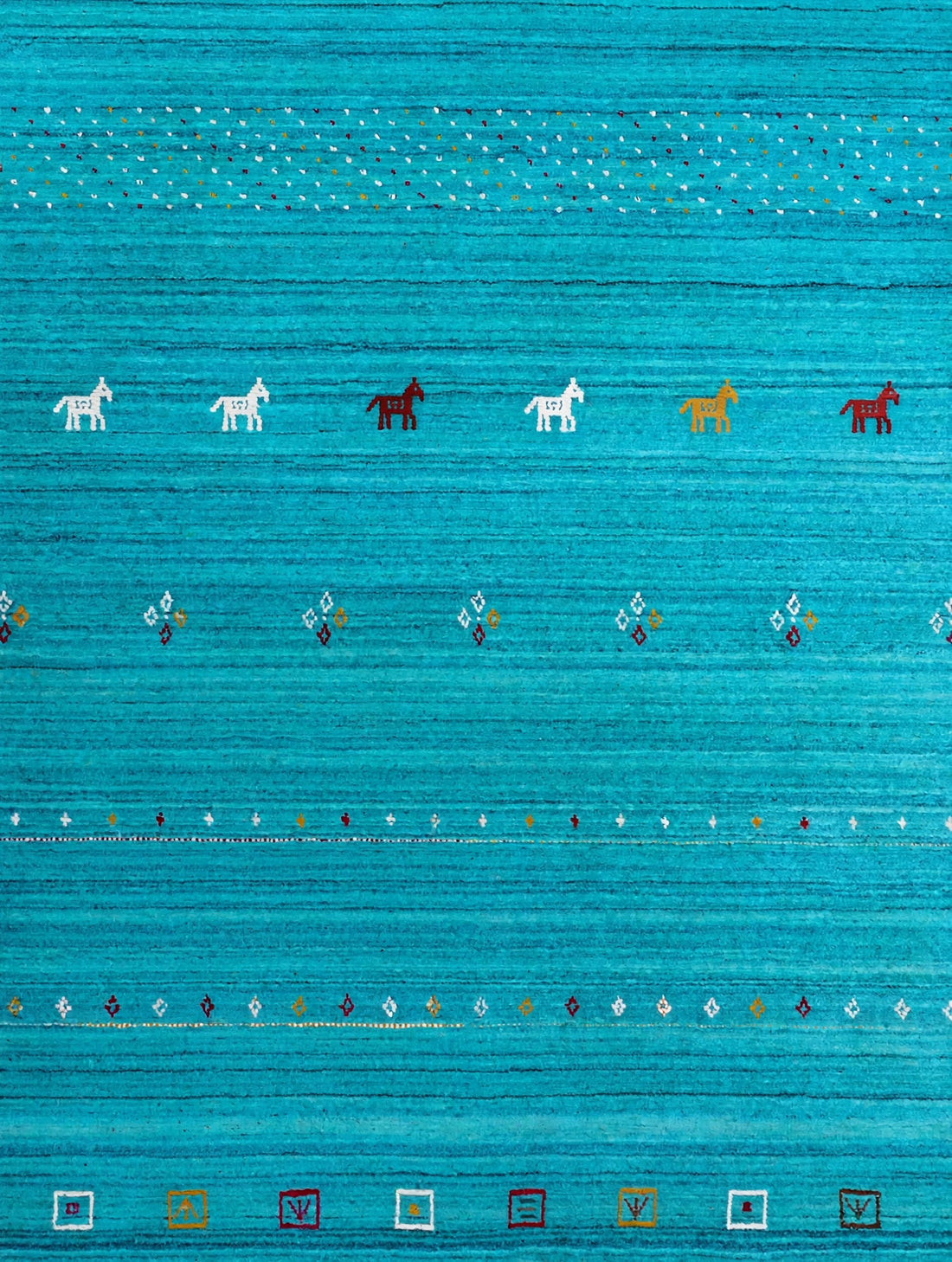 Turquoise Rug Flat Lay
